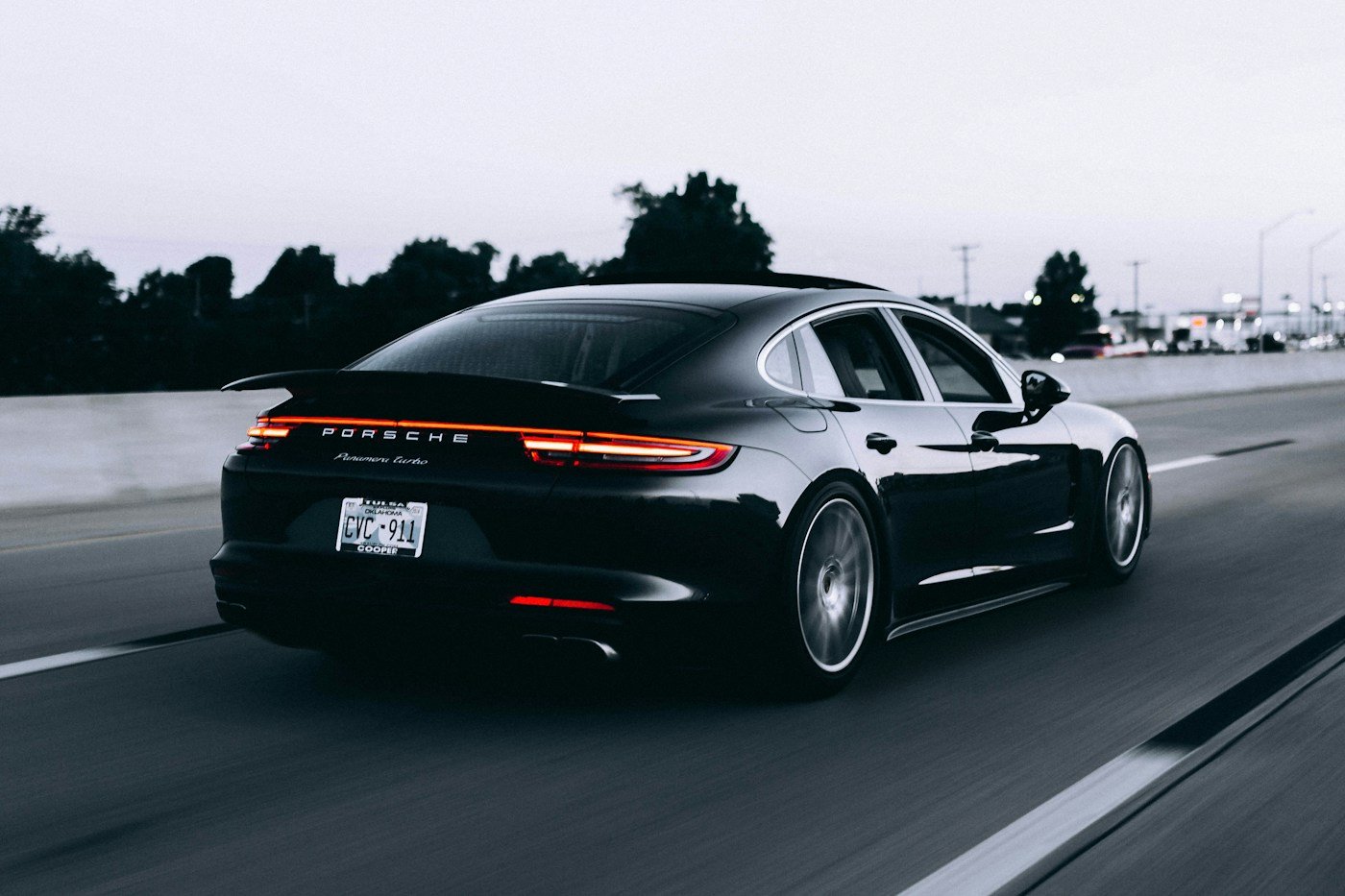 A Porsche sports car on a mountain road